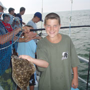 Nicholas Woska catching another huge Fluke on the Yankee3!